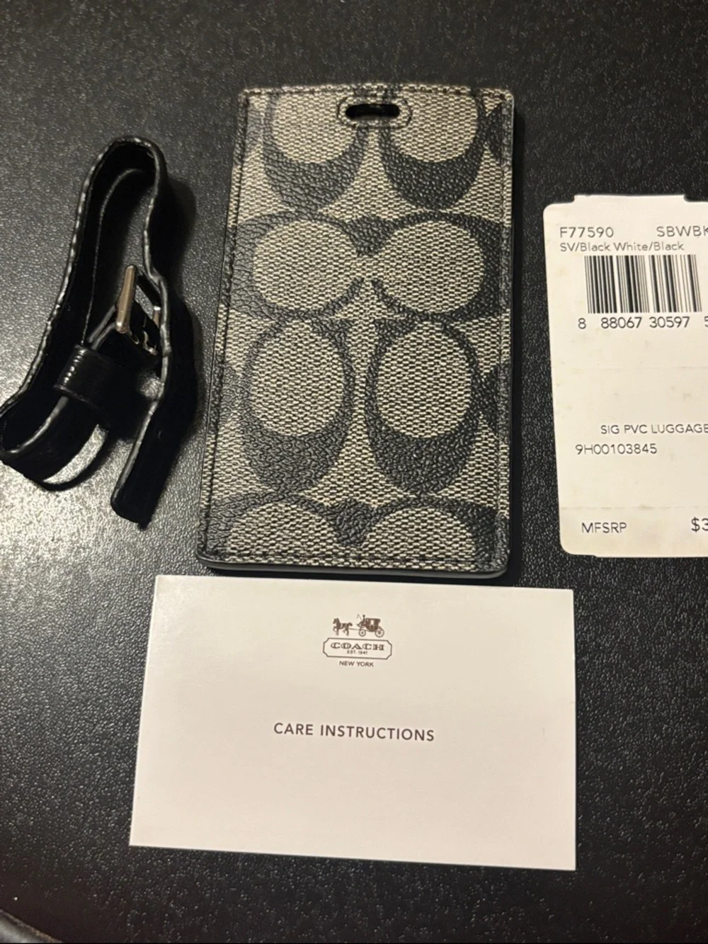 Coach Black and White Signature PVC Luggage Tag with Strap